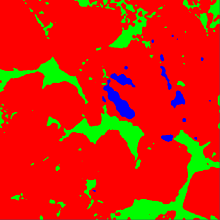Segmentation mask with large red particle regions, green inter-particle gaps, and scattered blue segments