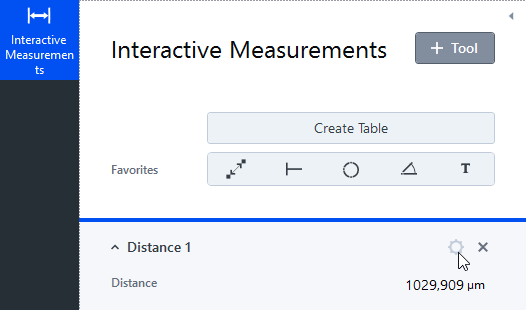 Interactive Measurements UI showing Distance 1 value 1029,909 µm and Create Table button