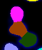 Magenta top blob above brown mid-section and green lower-right blob with pale blue area lower-left on black background