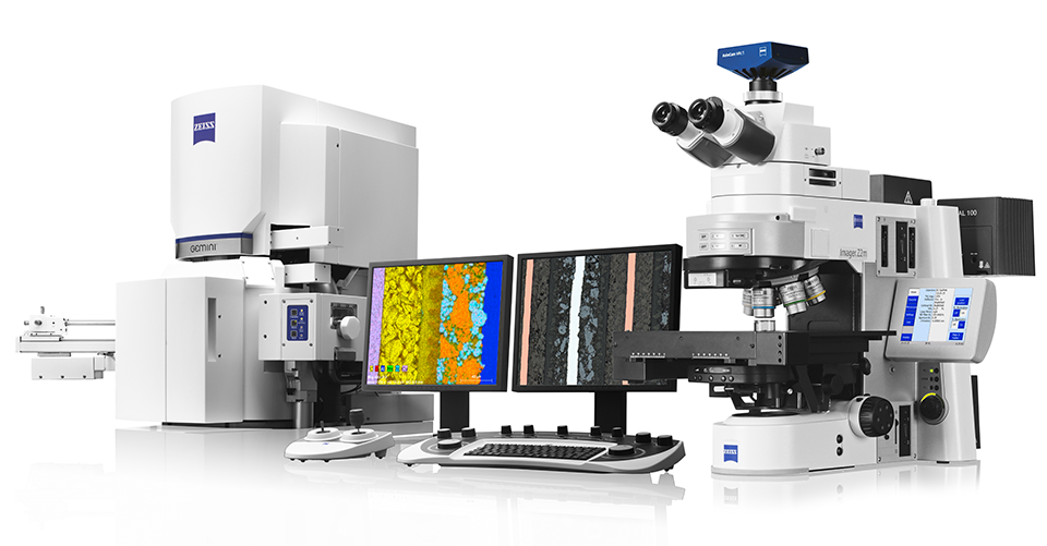 ZEISS SEM and light microscope correlative system with dual monitors displaying colorful microscopy images and control console.